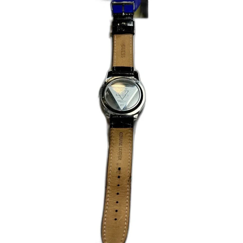 GUESS 25th Anniversary Floating Triangle Watch - NEW BATTERY